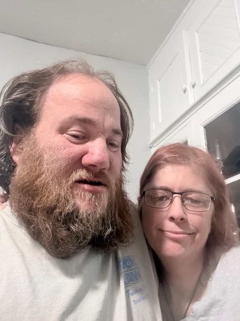 Richard and Megan smiling together